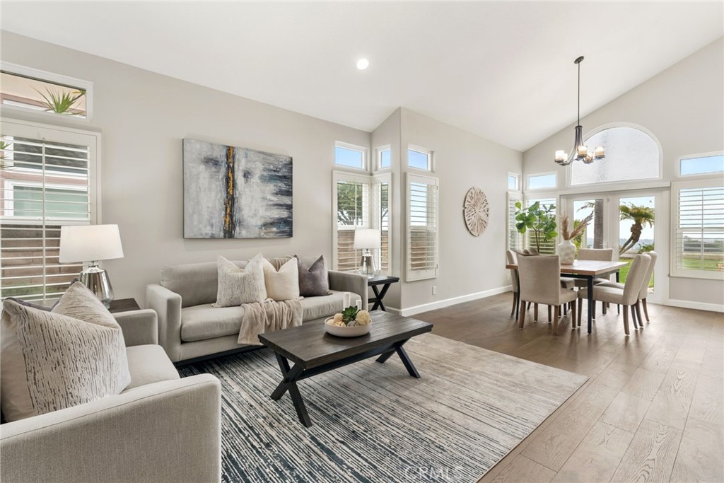 29632 Alta Terra Laguna Niguel, CA 92677 - Photo 10 of 37 a living room with furniture wooden floor and a table