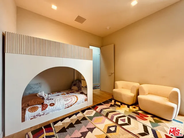 a living room with a couch and a table