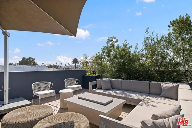 a view of terrace with seating area