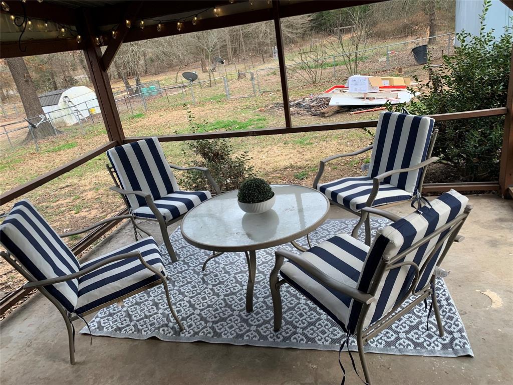 51 County Road Paris, TX 75460 - Photo 14 of 16 a view of a outdoor seating area