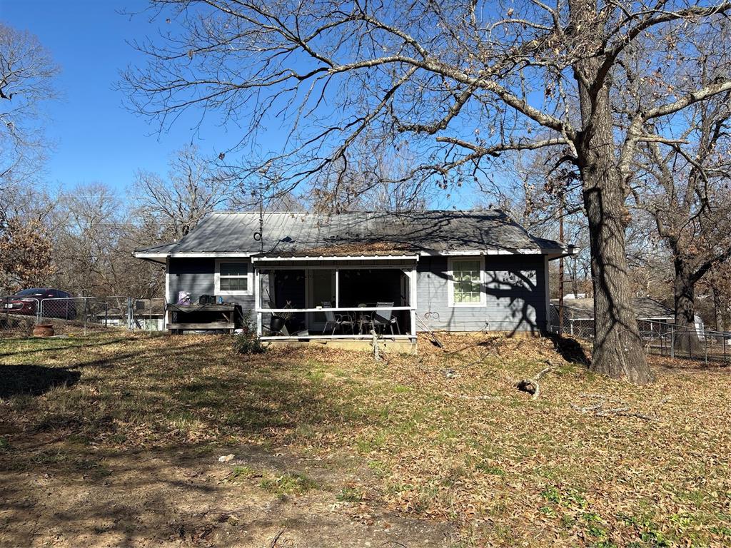51 County Road Paris, TX 75460 - Photo 16 of 16 a view of a house with a snow in the yard