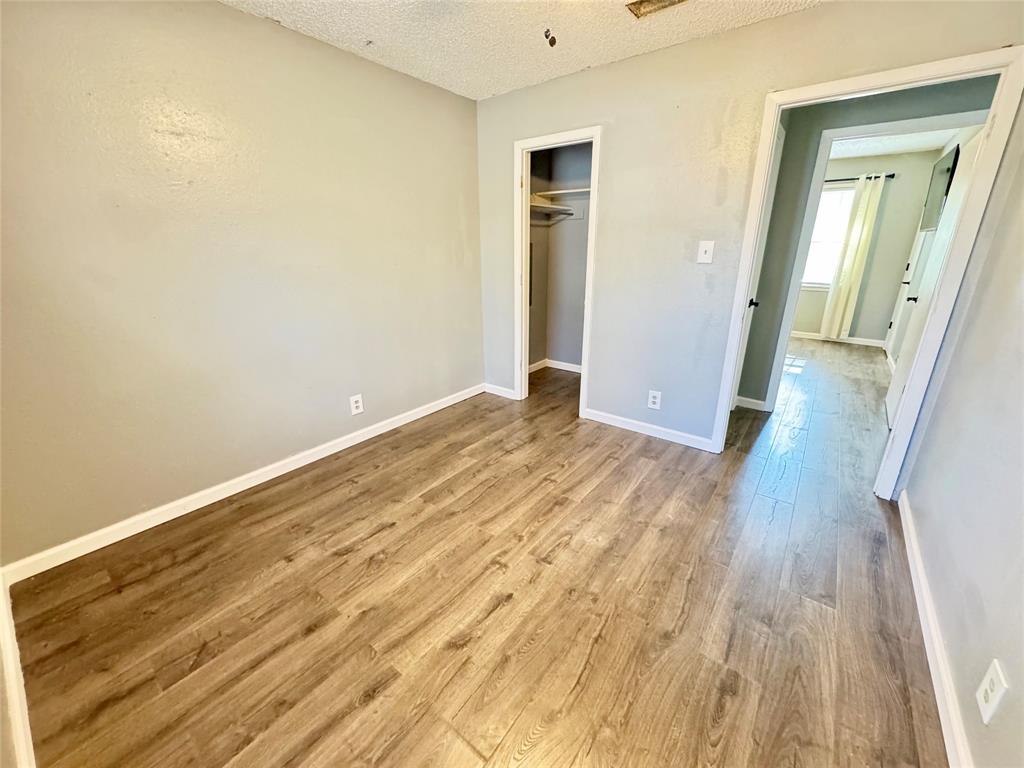 51 County Road Paris, TX 75460 - Photo 9 of 16 a view of hallway with wooden floor
