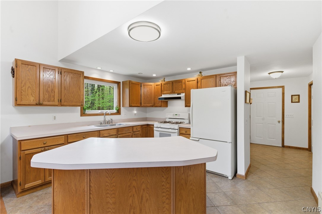 7566 Old Woods Road Preble, NY 13159 - Photo 14 of 50 Well appointed kitchen with ample cabinetry and c