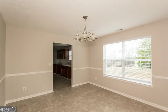 a view of a livingroom with a chandelier