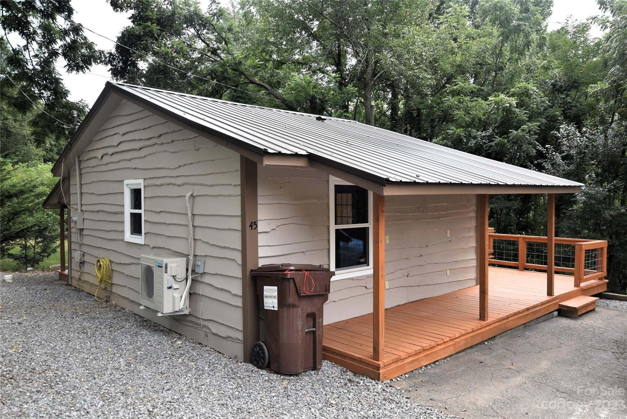 45 Mountainside Circle Maggie Valley, NC 28751 - Photo 2 of 13 a view of a house with a backyard