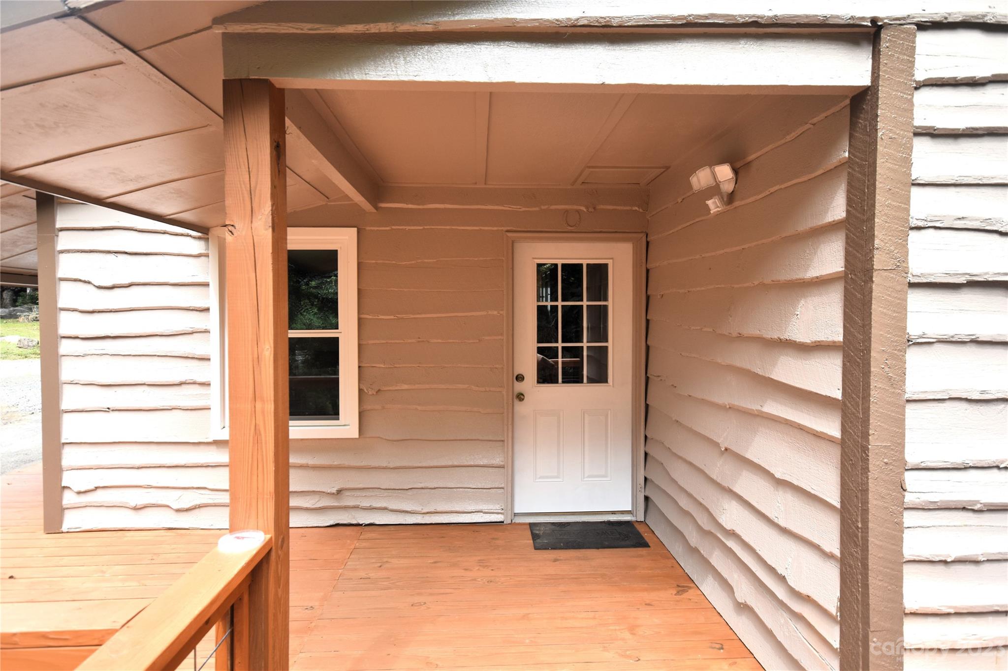 45 Mountainside Circle Maggie Valley, NC 28751 - Photo 5 of 13 a view of a house with a door and a window