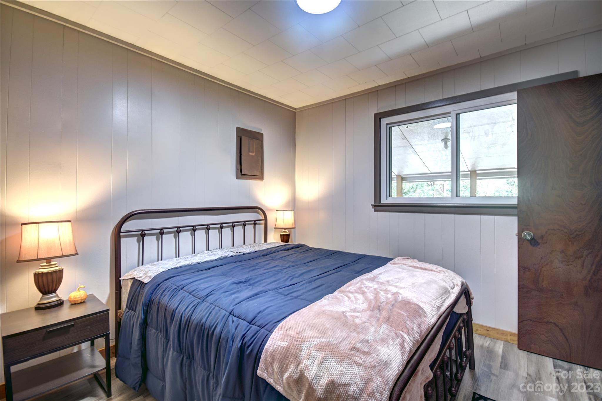 45 Mountainside Circle Maggie Valley, NC 28751 - Photo 10 of 13 a bedroom with a bed and a window