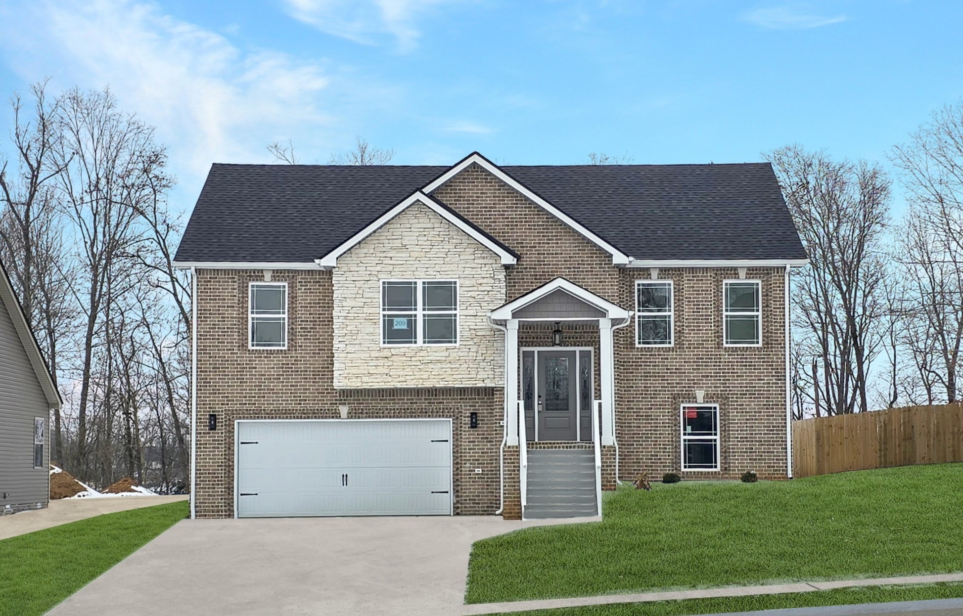 864 Burley Barn Road Clarksville, TN 37042 - Photo 1 of 24 a front view of a house with a yard