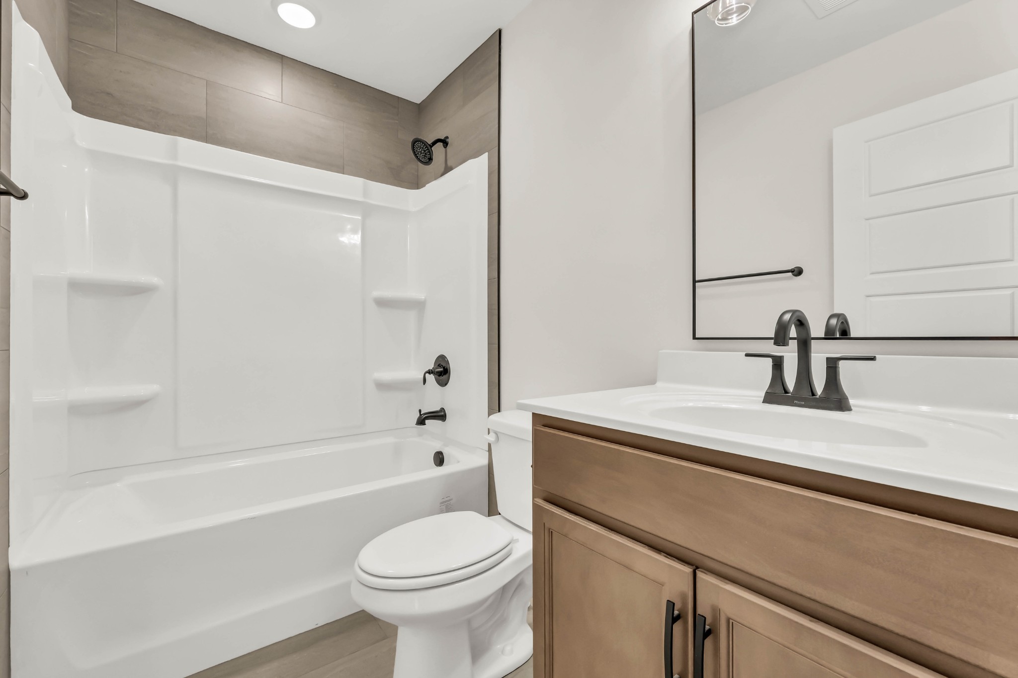 864 Burley Barn Road Clarksville, TN 37042 - Photo 16 of 24 a bathroom with a sink a toilet and a bathtub