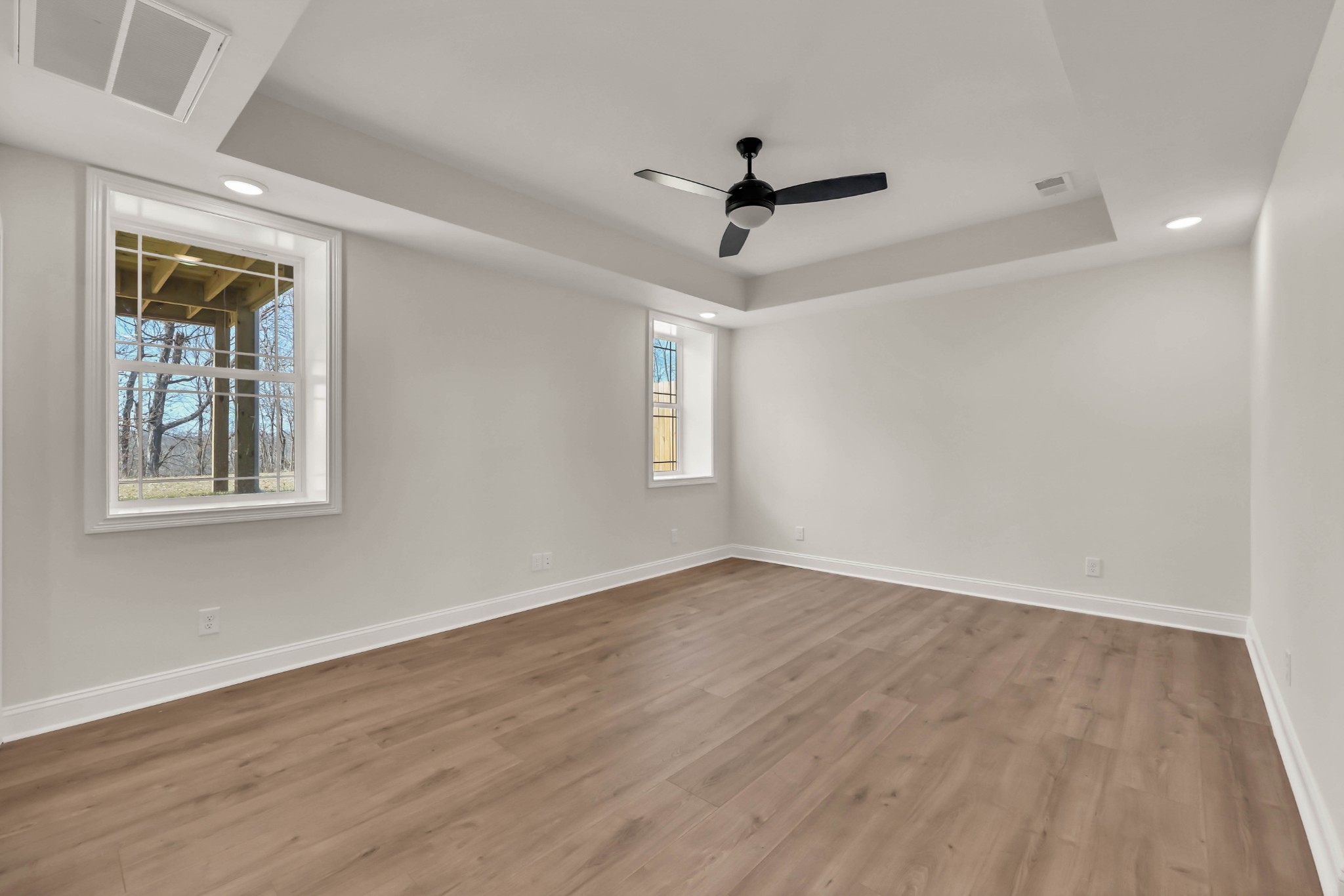 864 Burley Barn Road Clarksville, TN 37042 - Photo 17 of 24 a view of empty room with wooden floor and fan