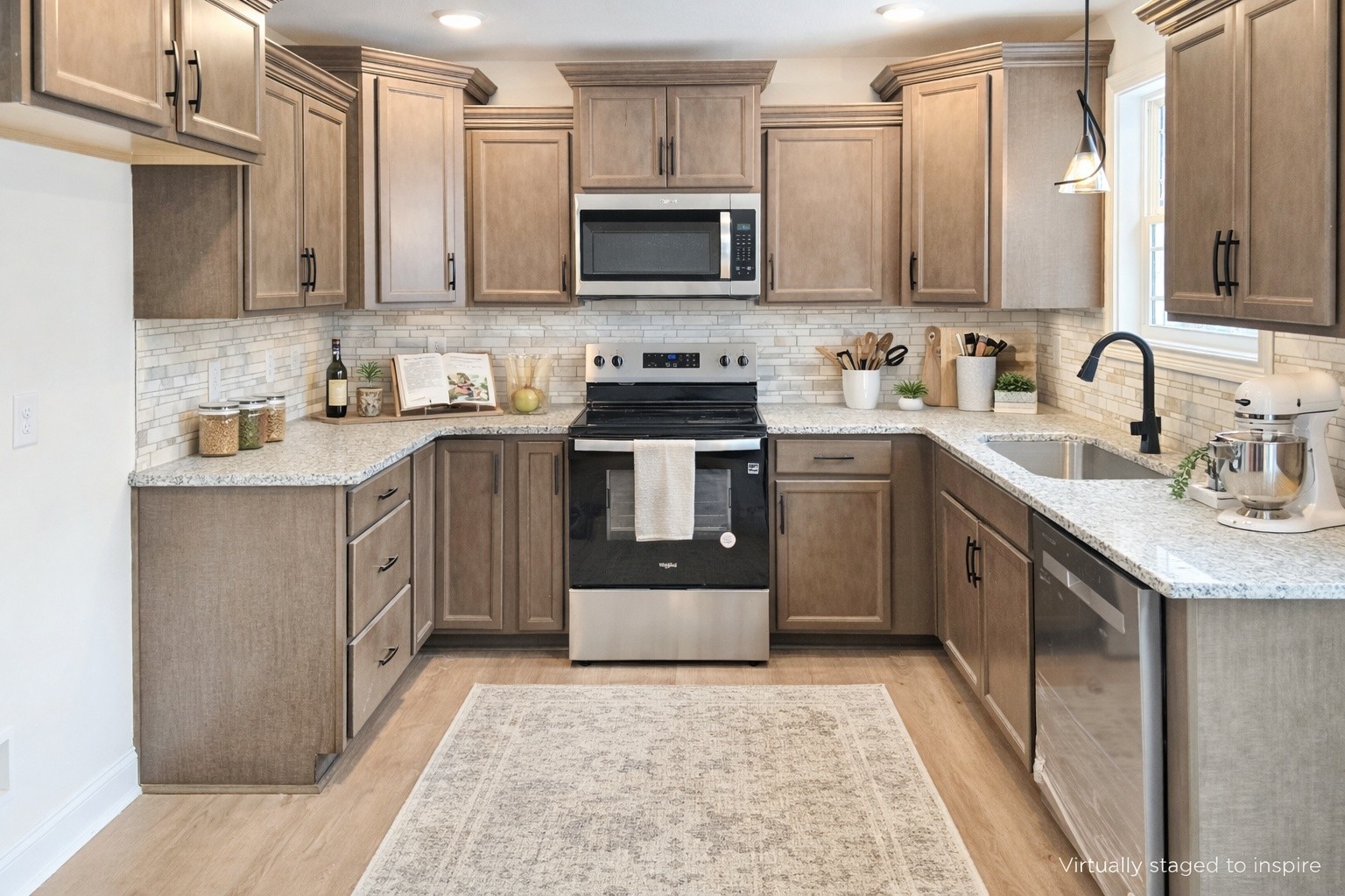 864 Burley Barn Road Clarksville, TN 37042 - Photo 3 of 24 a kitchen with a sink stove and cabinets