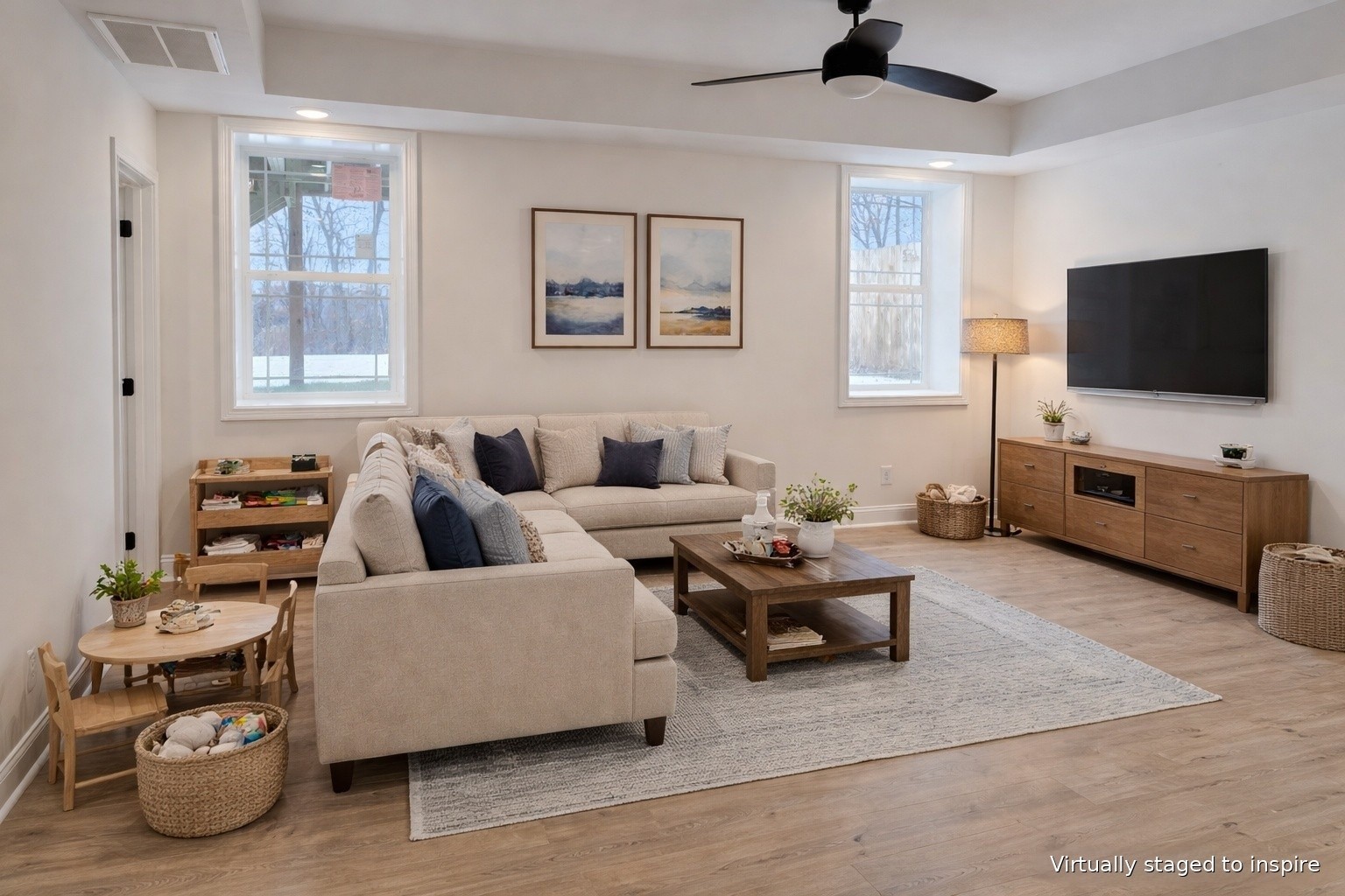 864 Burley Barn Road Clarksville, TN 37042 - Photo 5 of 24 a living room with furniture and a flat screen tv