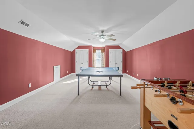 a view of a room with windows air conditioner and a window