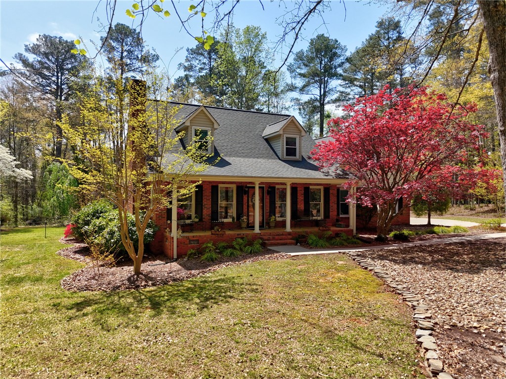 1010 Ridgeview Drive Pendleton, SC 29670 - Photo 40 of 47 This charming home offers a welcoming facade with a beautiful natural backdrop.