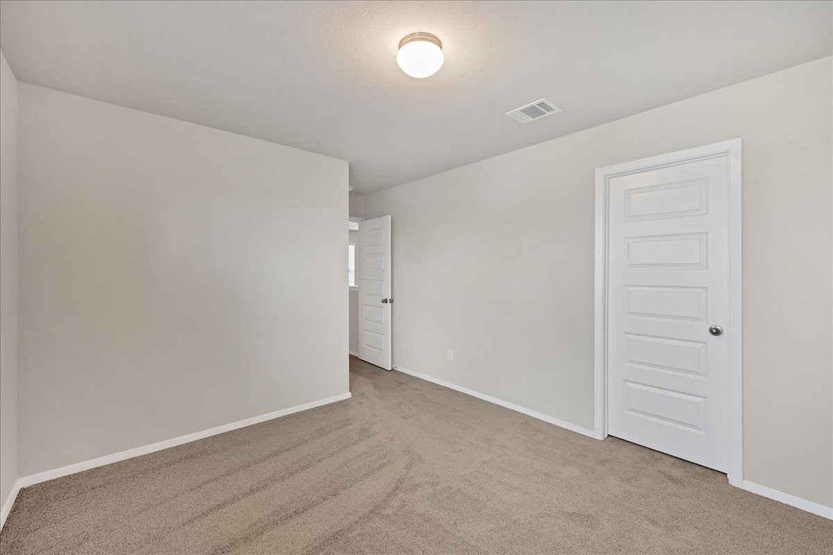 116 Honeybee Lane Elgin, TX 78621 - Photo 25 of 37 a view of an empty room