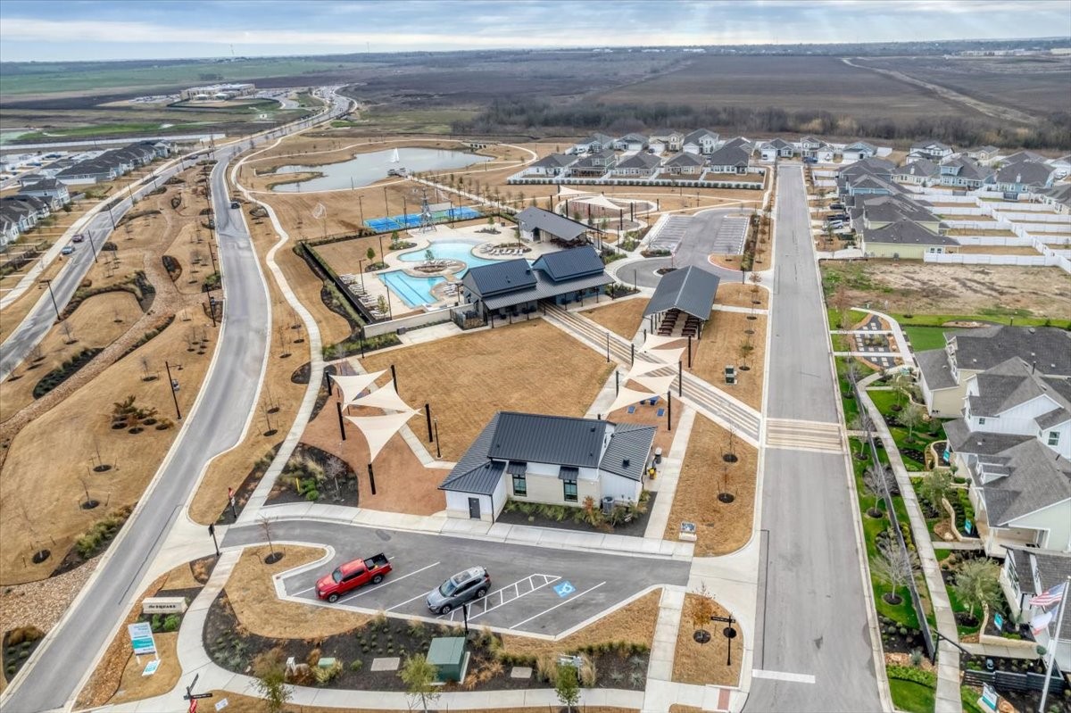 116 Honeybee Lane Elgin, TX 78621 - Photo 36 of 37 an aerial view of a house with a ocean