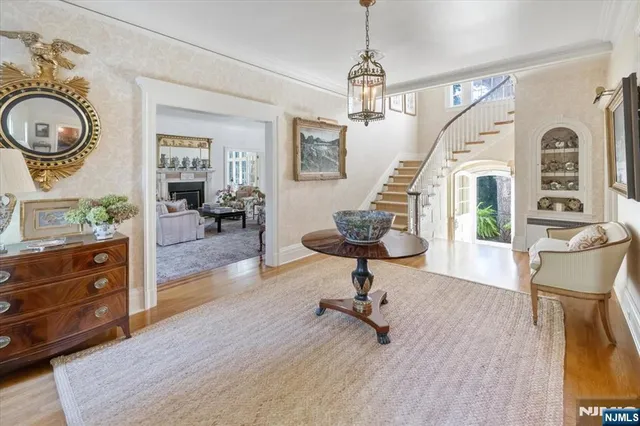 a view of a livingroom with furniture and a wooden floor