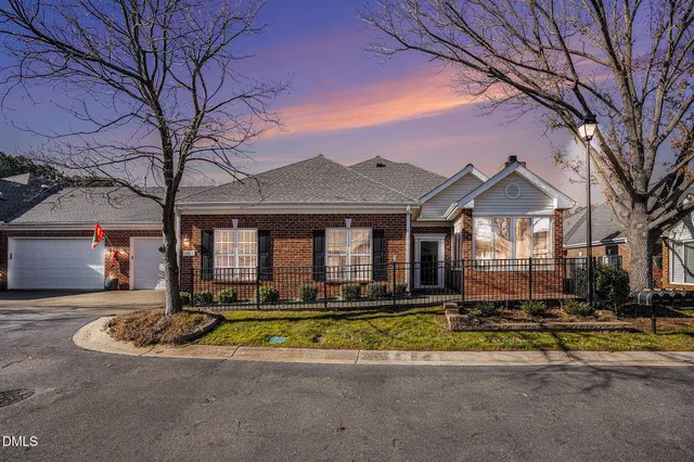 a front view of a house with swimming pool