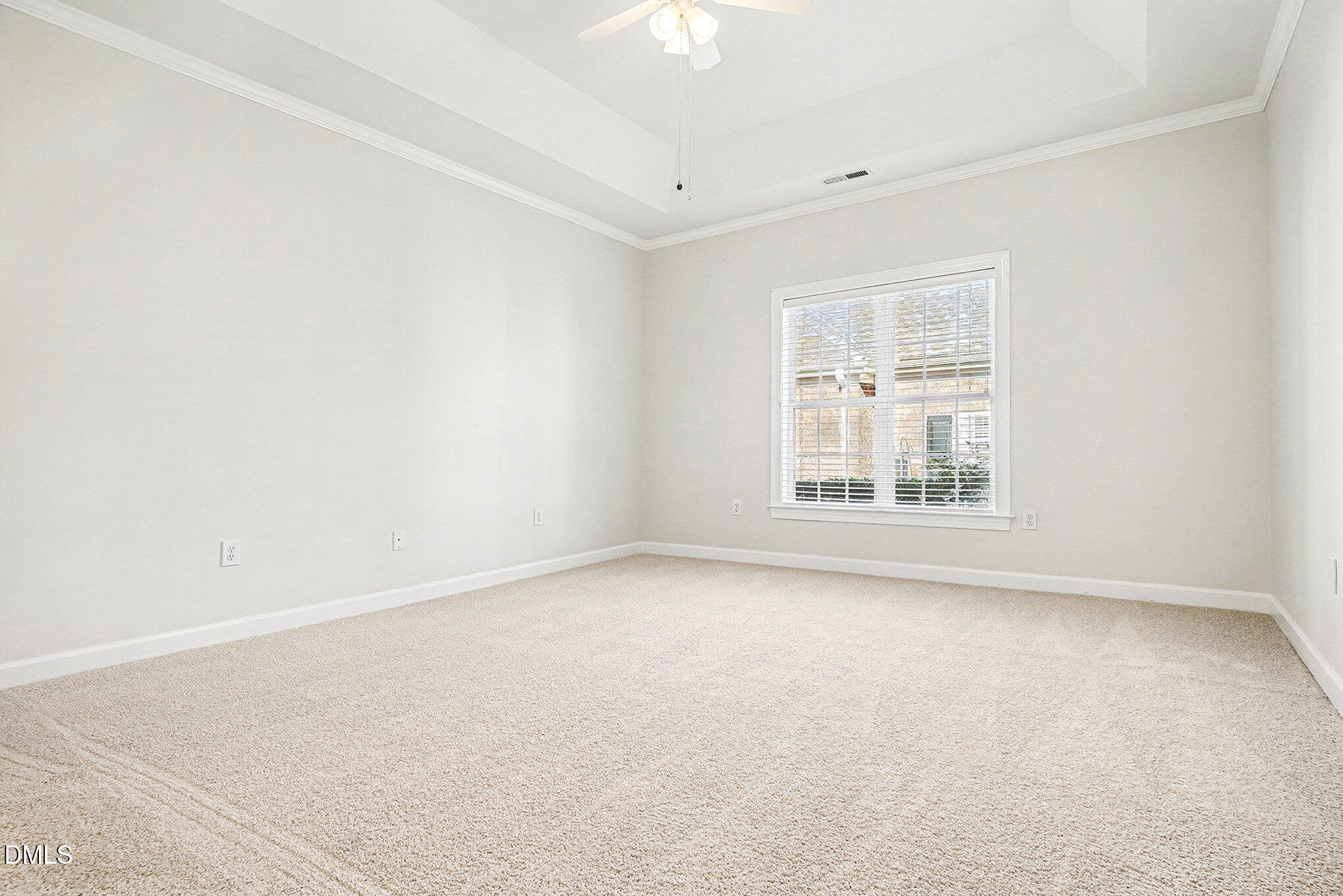 4703 Lewisham Court Raleigh, NC 27612 - Photo 13 of 27 an empty room with windows