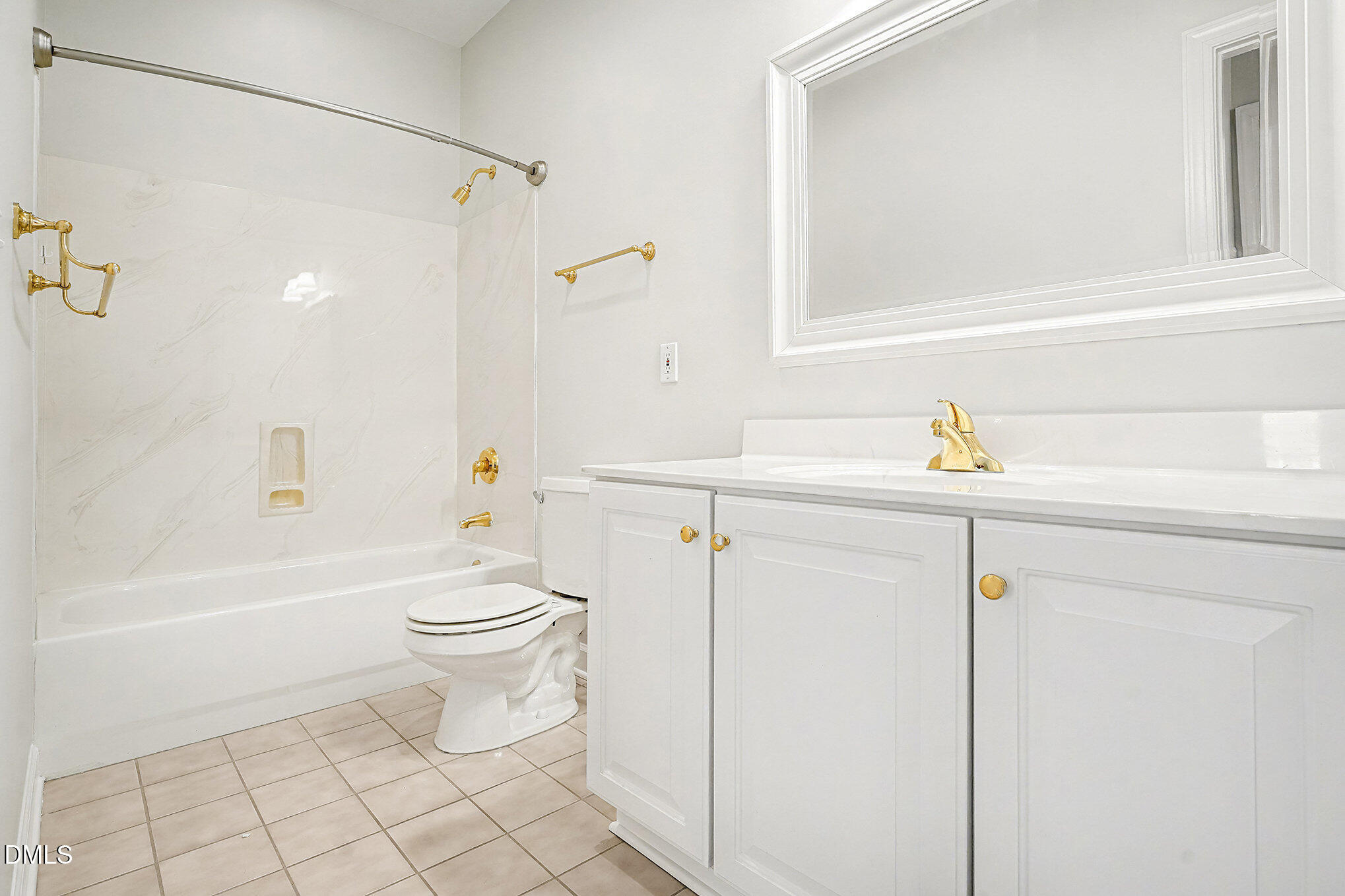 4703 Lewisham Court Raleigh, NC 27612 - Photo 21 of 27 a bathroom with a sink a toilet and shower