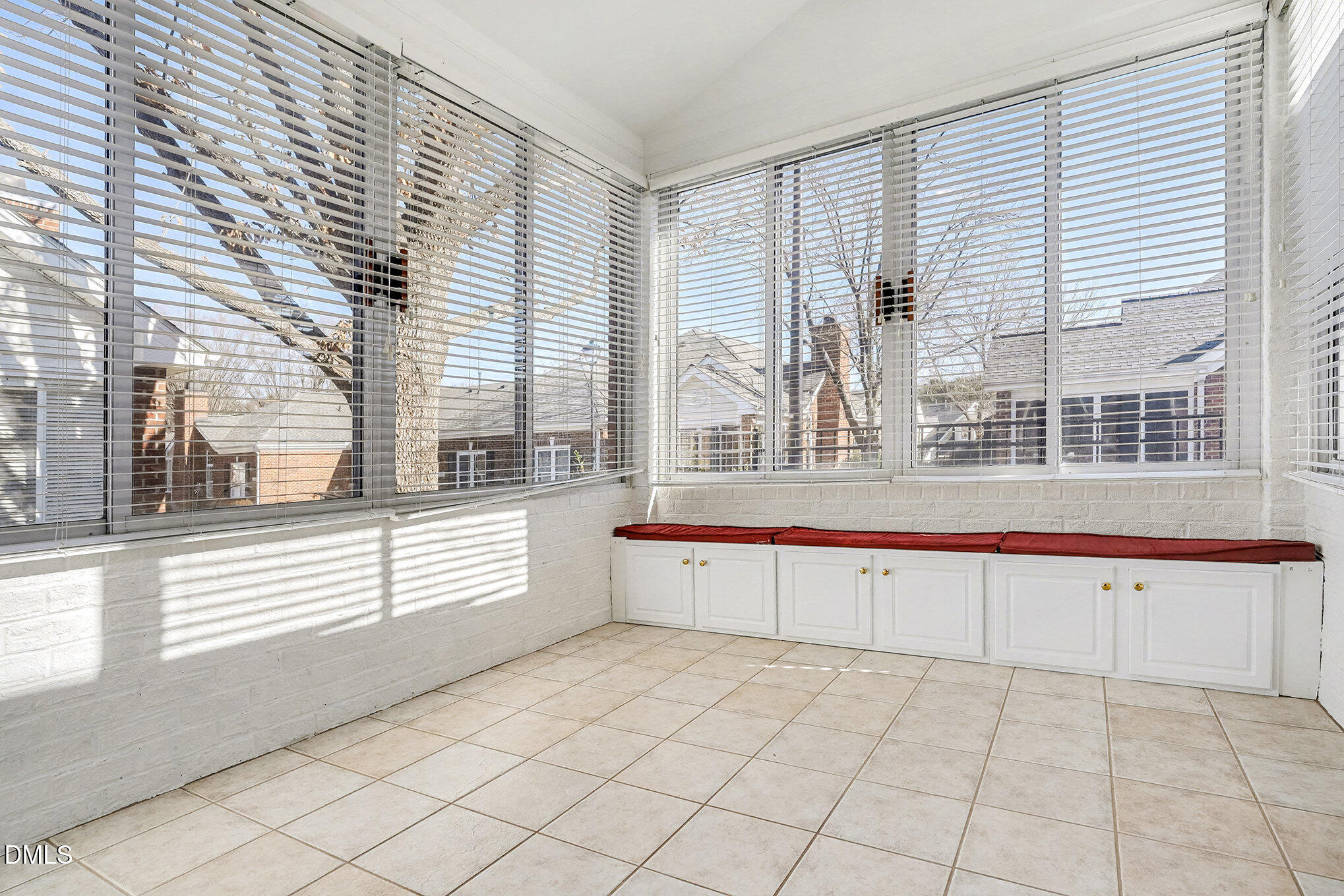 4703 Lewisham Court Raleigh, NC 27612 - Photo 22 of 27 a view of a kitchen with granite countertop a large window