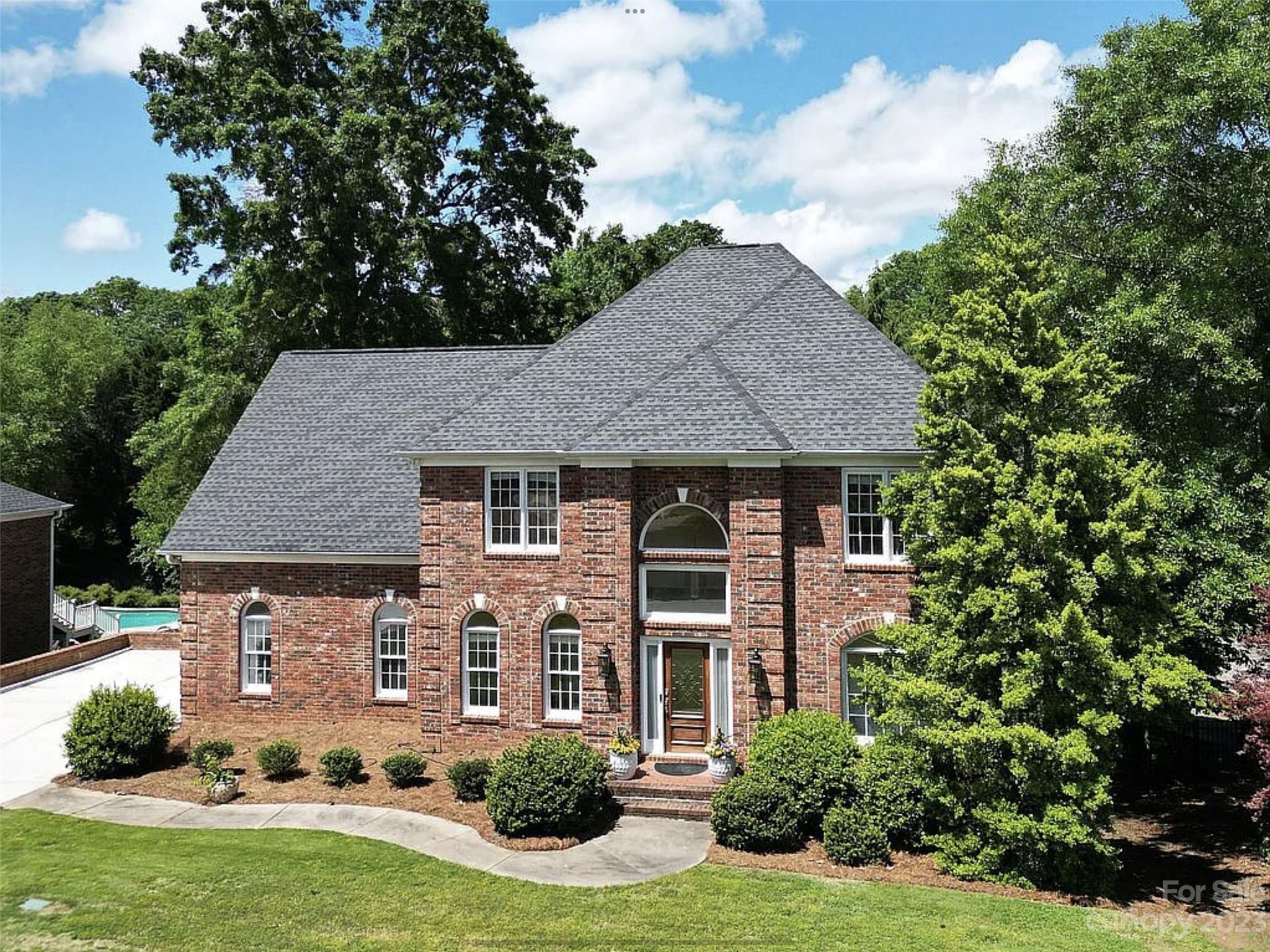 351 Gringley Hill Road Fort Mill, SC 29708 - Photo 1 of 1 a aerial view of a house with yard and green space