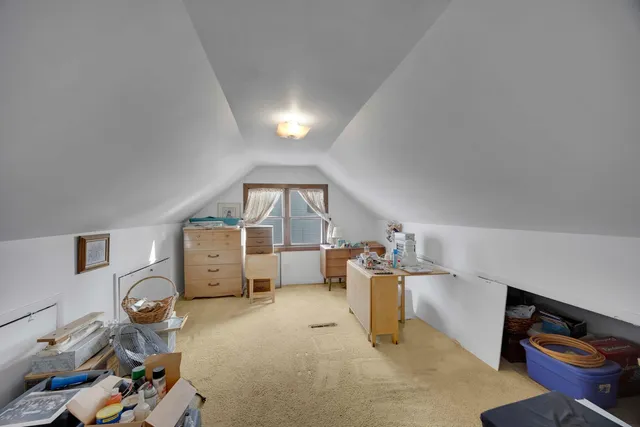 a workspace with furniture and a window