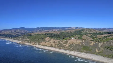 a view of a lake with mountains in the background