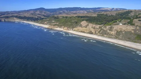a view of lake with mountain