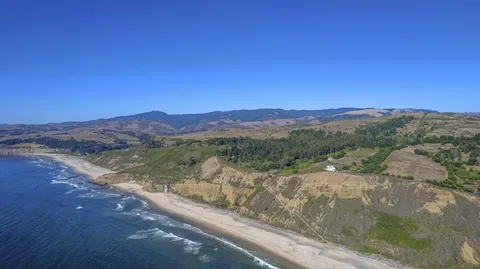 a view of a lake with mountains in the background