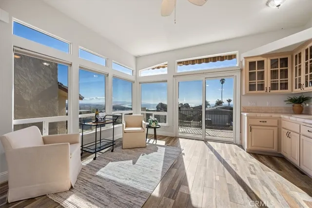a kitchen with a sink cabinets and a window