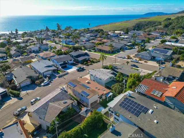an aerial view of a house with a garden