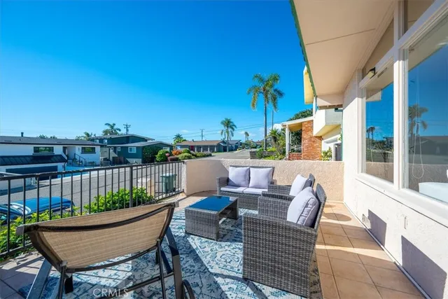 a bedroom with a bed a mirror and desk
