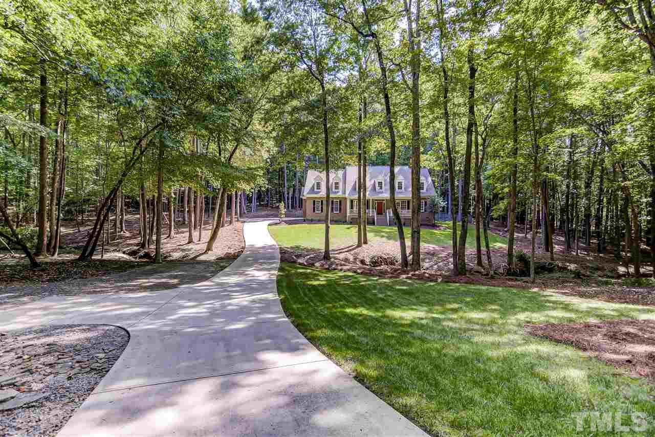 10424 Roadstead Way West Raleigh, NC 27613 - Photo 1 of 29 a view of a park with large trees