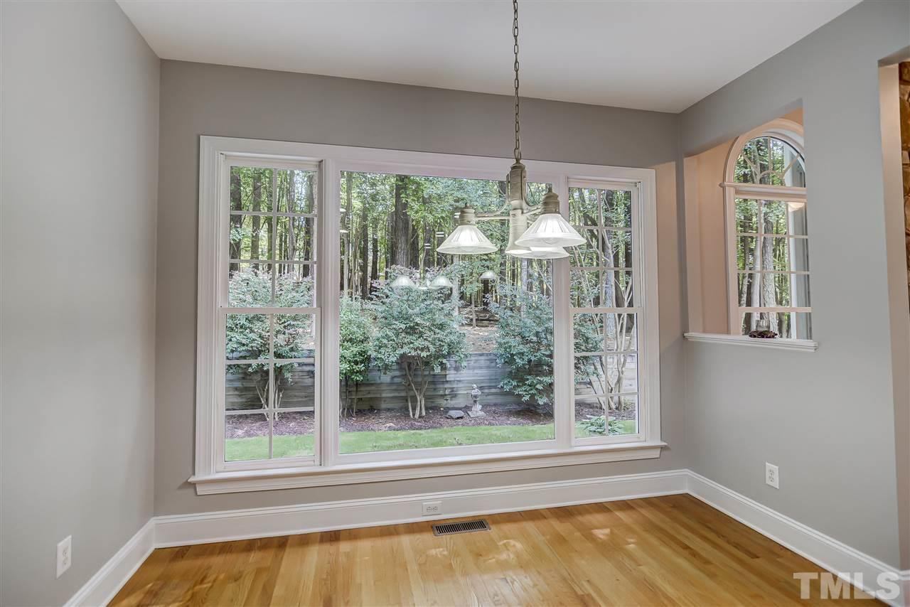 10424 Roadstead Way West Raleigh, NC 27613 - Photo 15 of 29 a view of a room with windows and chandelier