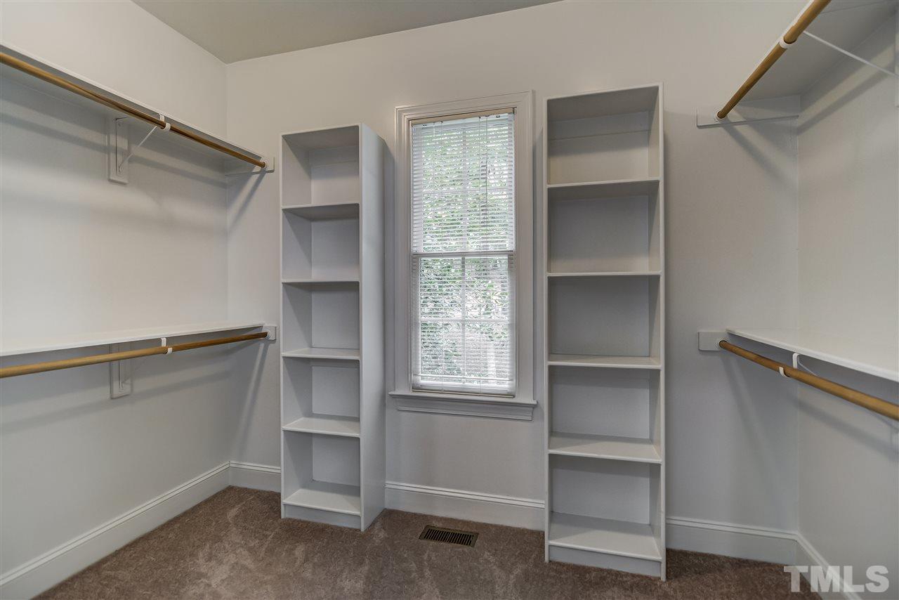 10424 Roadstead Way West Raleigh, NC 27613 - Photo 19 of 29 a room with walk in closet and window
