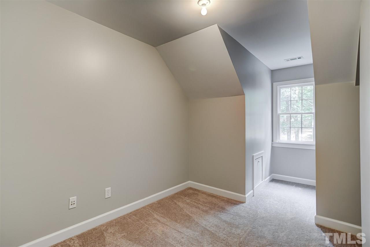 10424 Roadstead Way West Raleigh, NC 27613 - Photo 20 of 29 an empty room with windows