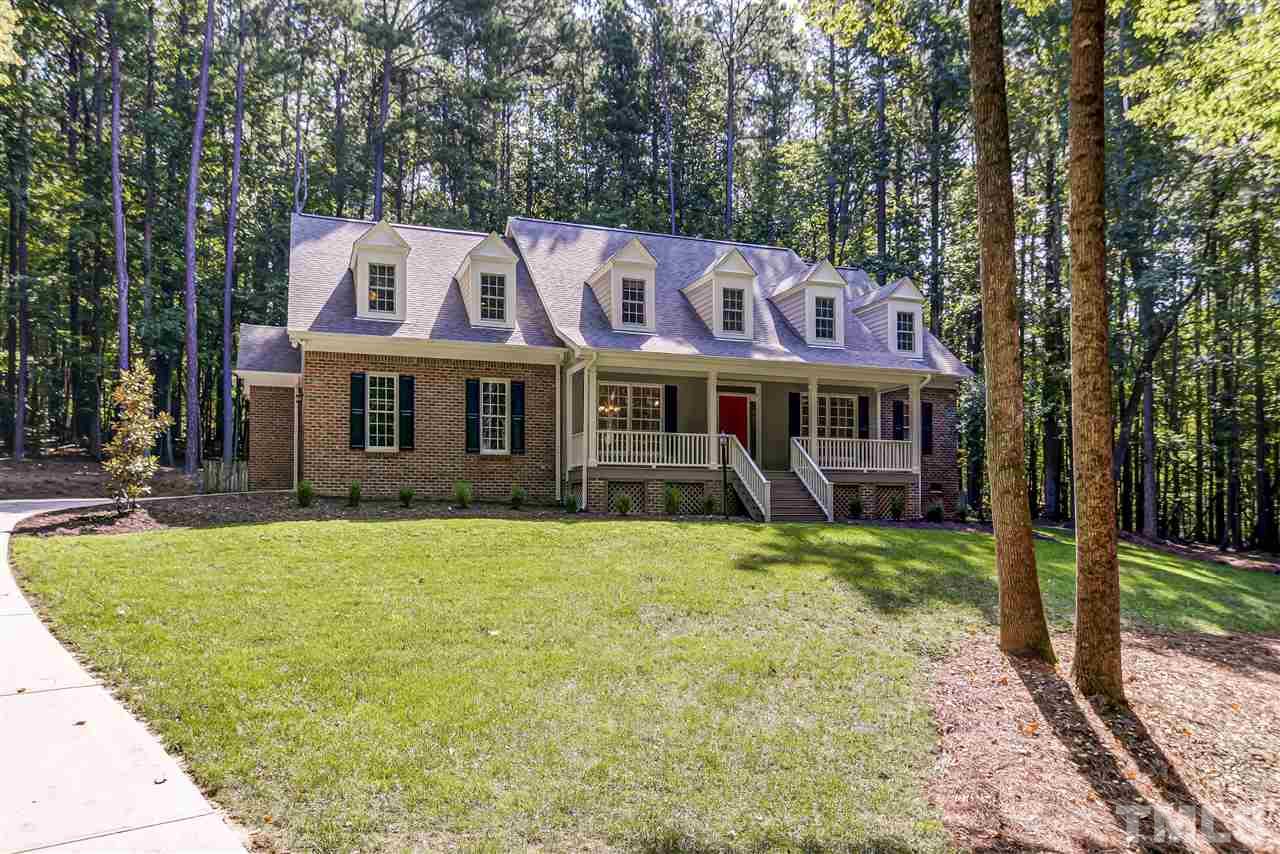 10424 Roadstead Way West Raleigh, NC 27613 - Photo 3 of 29 a front view of a house with a yard