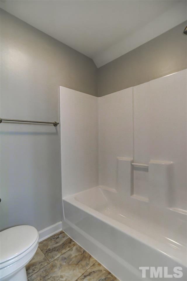 10424 Roadstead Way West Raleigh, NC 27613 - Photo 23 of 29 a bathroom with a shower and a toilet