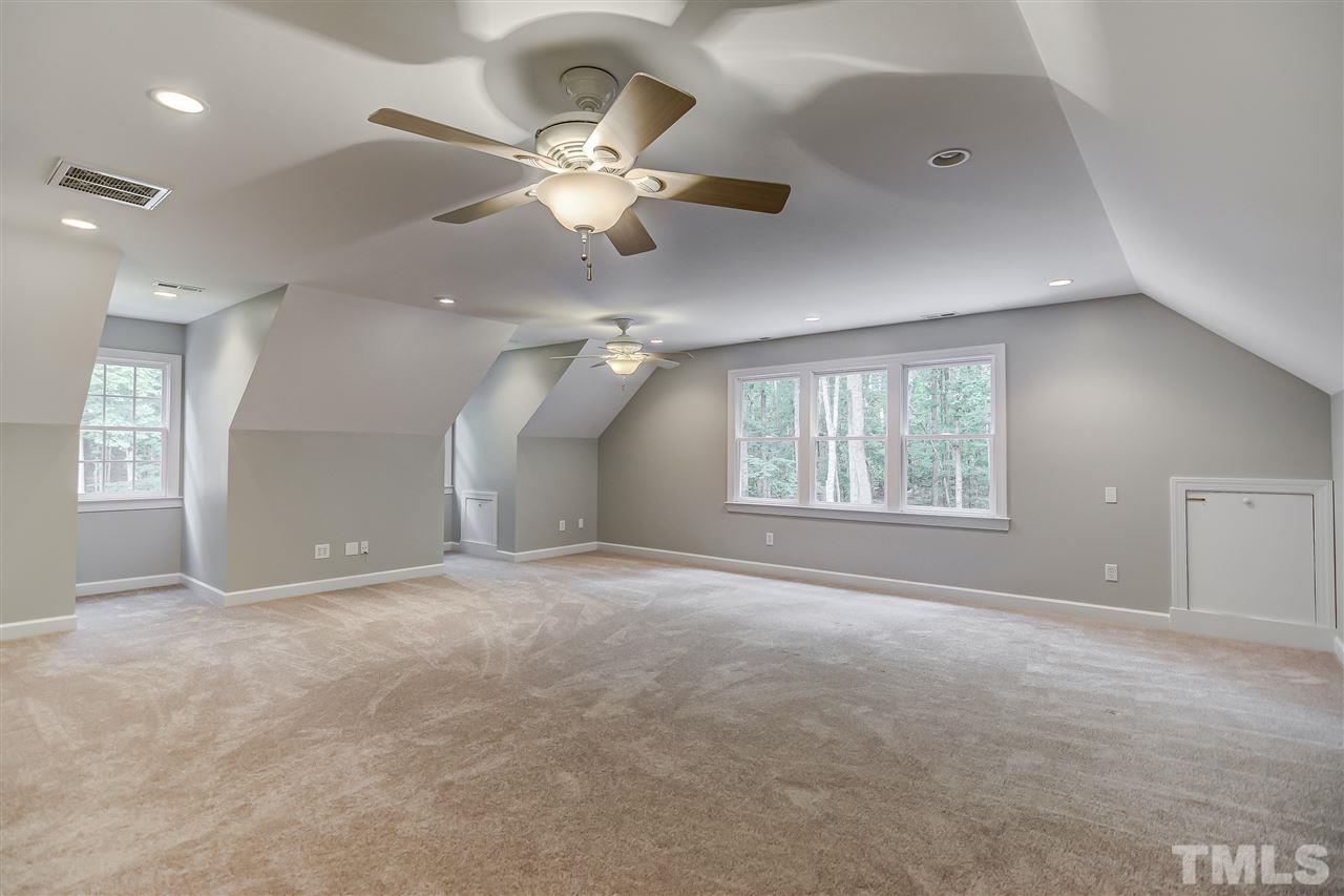 10424 Roadstead Way West Raleigh, NC 27613 - Photo 26 of 29 a view of an empty room with a window