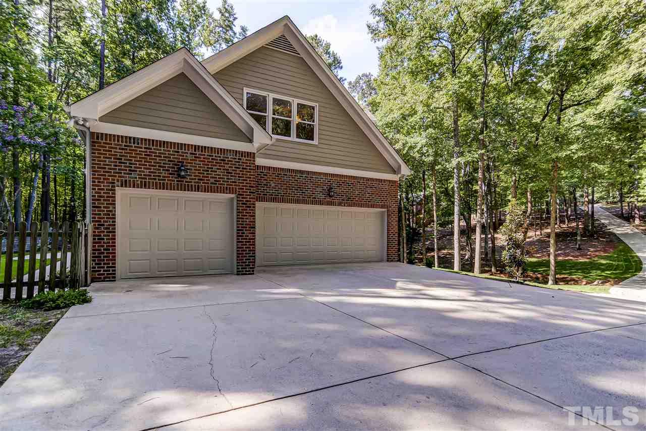 10424 Roadstead Way West Raleigh, NC 27613 - Photo 28 of 29 a front view of a house with a garage
