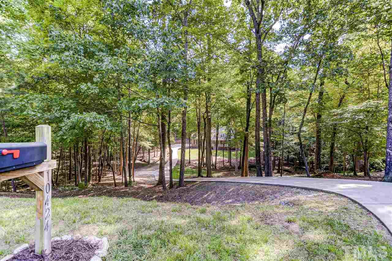 10424 Roadstead Way West Raleigh, NC 27613 - Photo 4 of 29 a view of outdoor space with trees