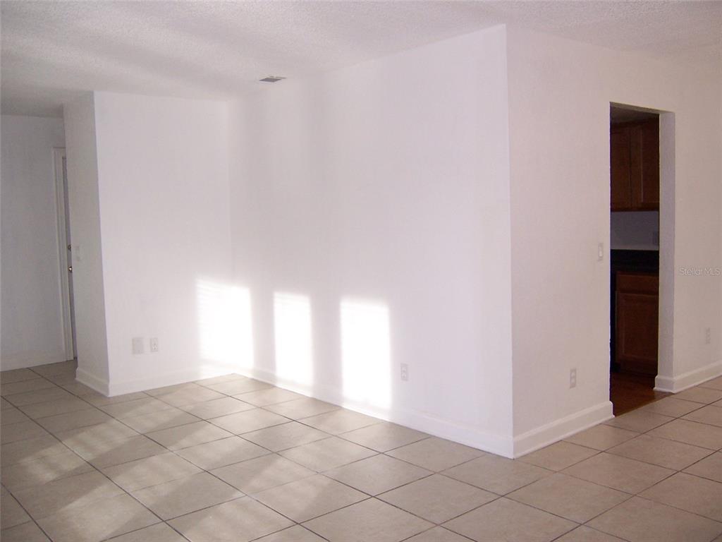 2703 Middle Street Orlando, FL 32807 - Photo 5 of 18 a view of an empty room and window