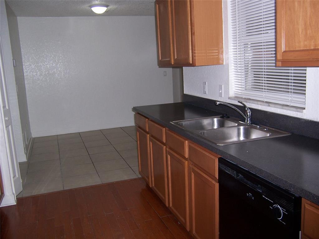 2703 Middle Street Orlando, FL 32807 - Photo 6 of 18 a kitchen with a sink and a window