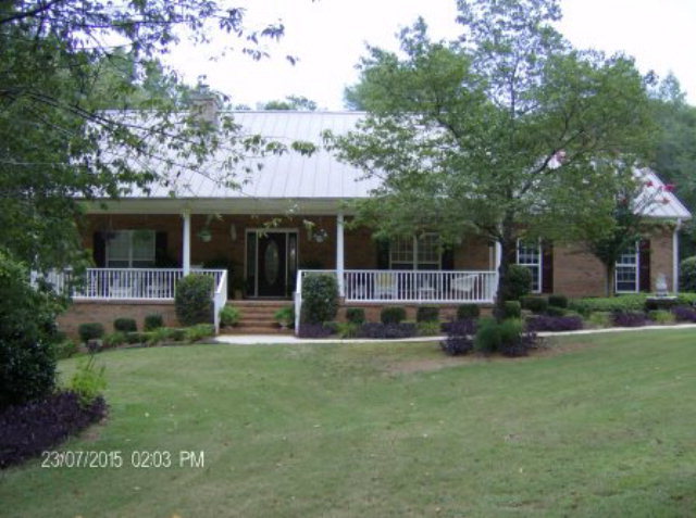 130 Riverbend Road Jackson, GA 30233 - Photo 1 of 29 a view of house with outdoor entertaining space