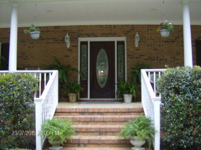 130 Riverbend Road Jackson, GA 30233 - Photo 2 of 29 a front view of a house with a garden