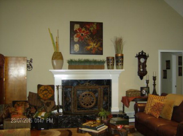 130 Riverbend Road Jackson, GA 30233 - Photo 6 of 29 a living room with furniture and a fireplace