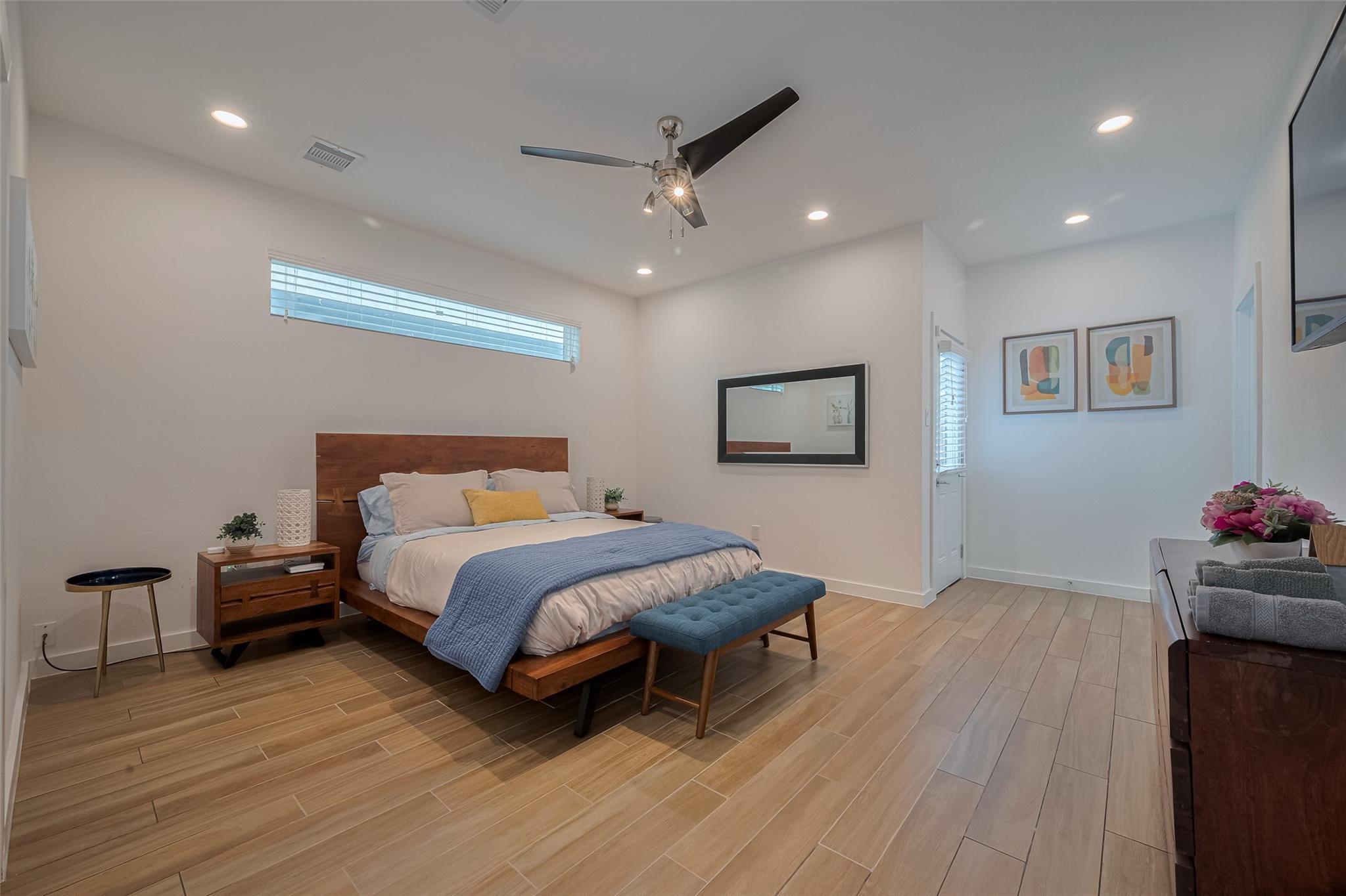 1902 Dan Street Houston, TX 77020 - Photo 17 of 43 The first-floor primary suite is a serene retreat with spa-inspired en-suite bath