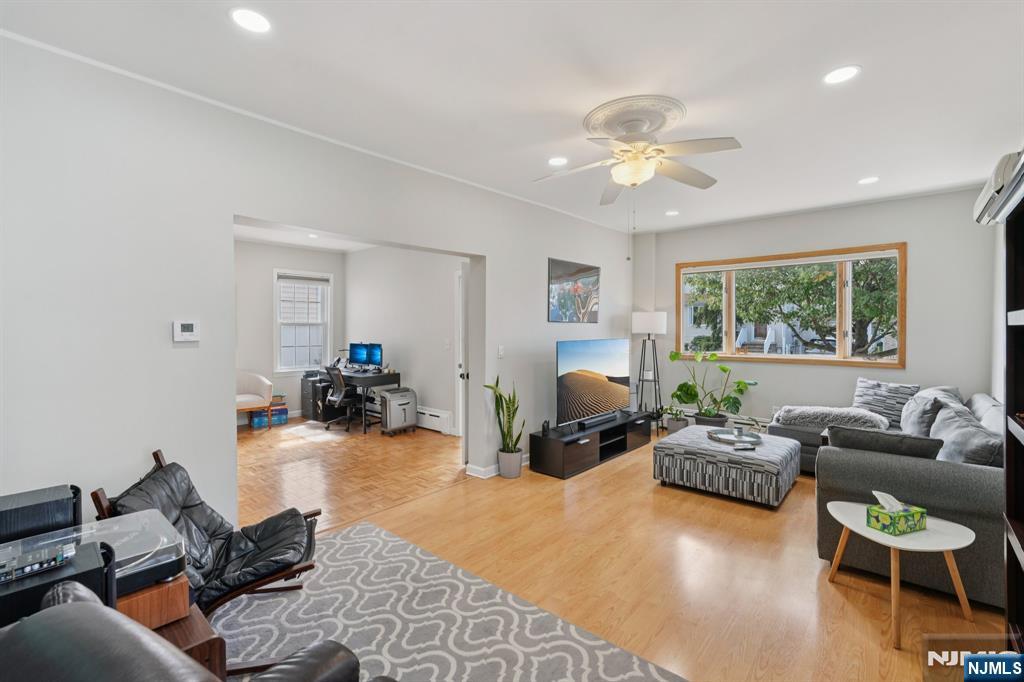 471 Harding Avenue Lyndhurst, NJ 07071 - Photo 15 of 50 a living room with furniture and a chandelier
