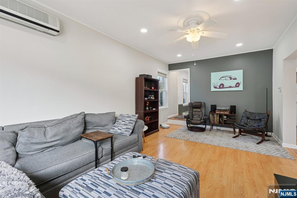 471 Harding Avenue Lyndhurst, NJ 07071 - Photo 16 of 50 a living room with furniture and wooden floor